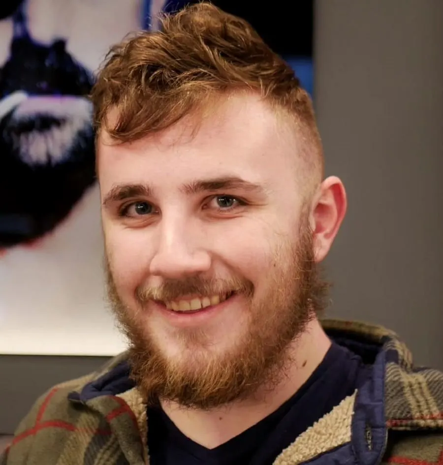 messy faux hawk with scruffy beard