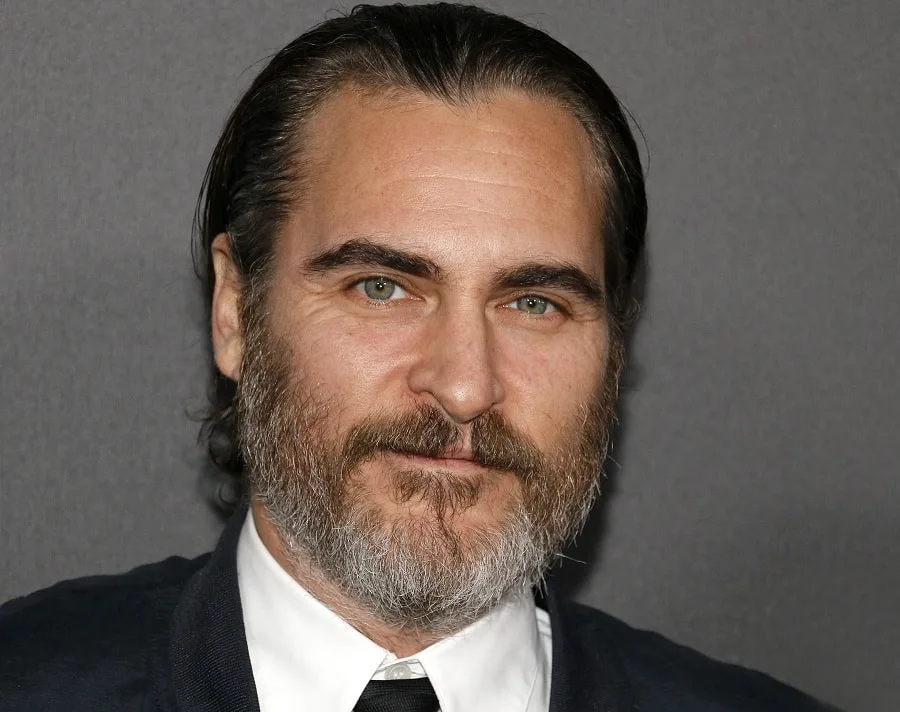 over 40 actor Joaquin Phoenix with short grey beard