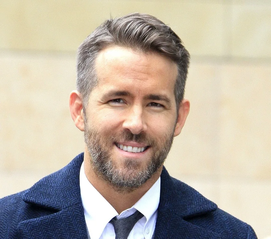 over 40 actor Ryan Reynolds with heavy stubble beard