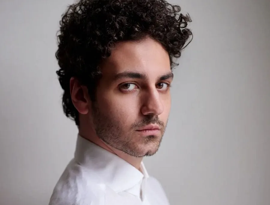 young actor Ehren Kassam with light stubble beard