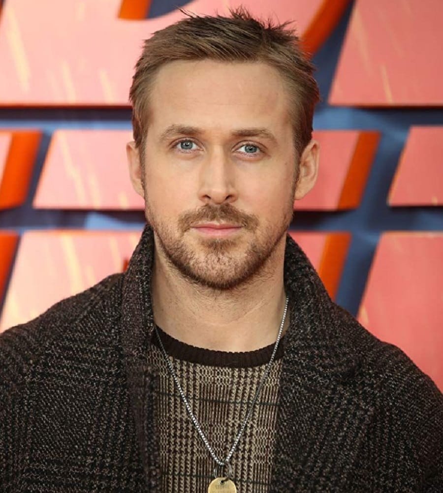 Ryan Gosling with short beard and mustache