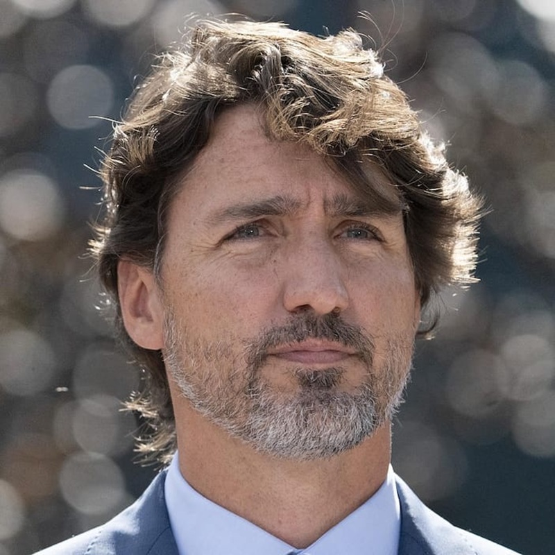 Short salt and pepper beard on Justin Trudeau