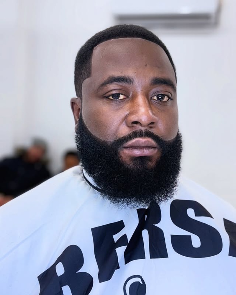 thick, full Garibaldi beard with a broad, naturally rounded bottom edge