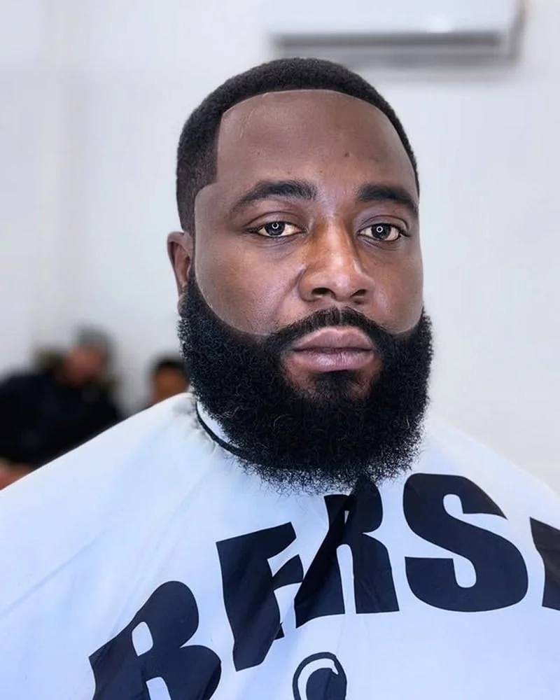 thick, full Garibaldi beard with a broad, naturally rounded bottom edge