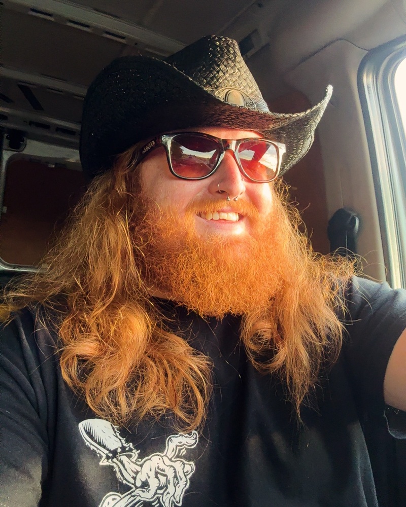 Long, bushy ginger cowboy beard and mustache