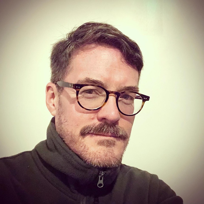 man with thick chevron mustache