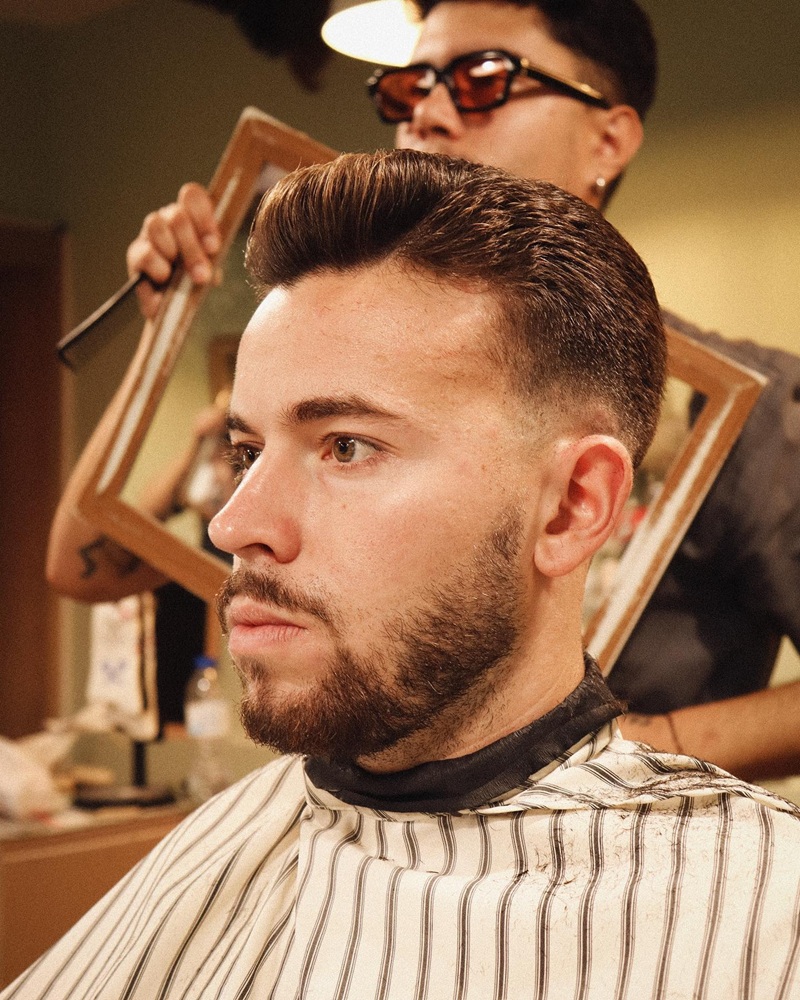 short pompadour hairstyle with beard