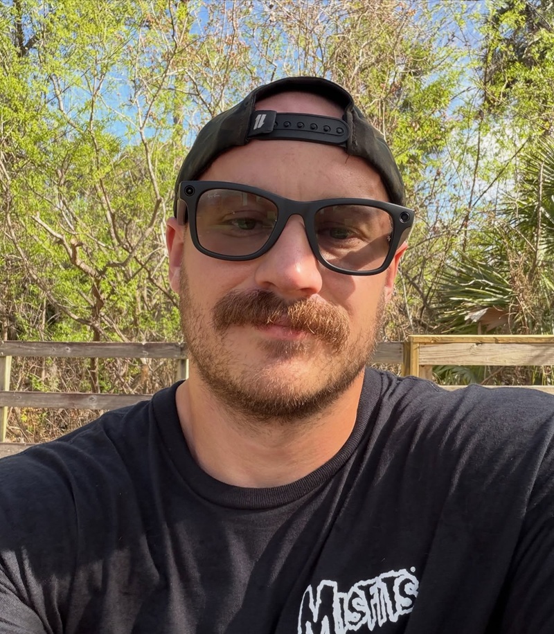 thick mustache with light stubble beard